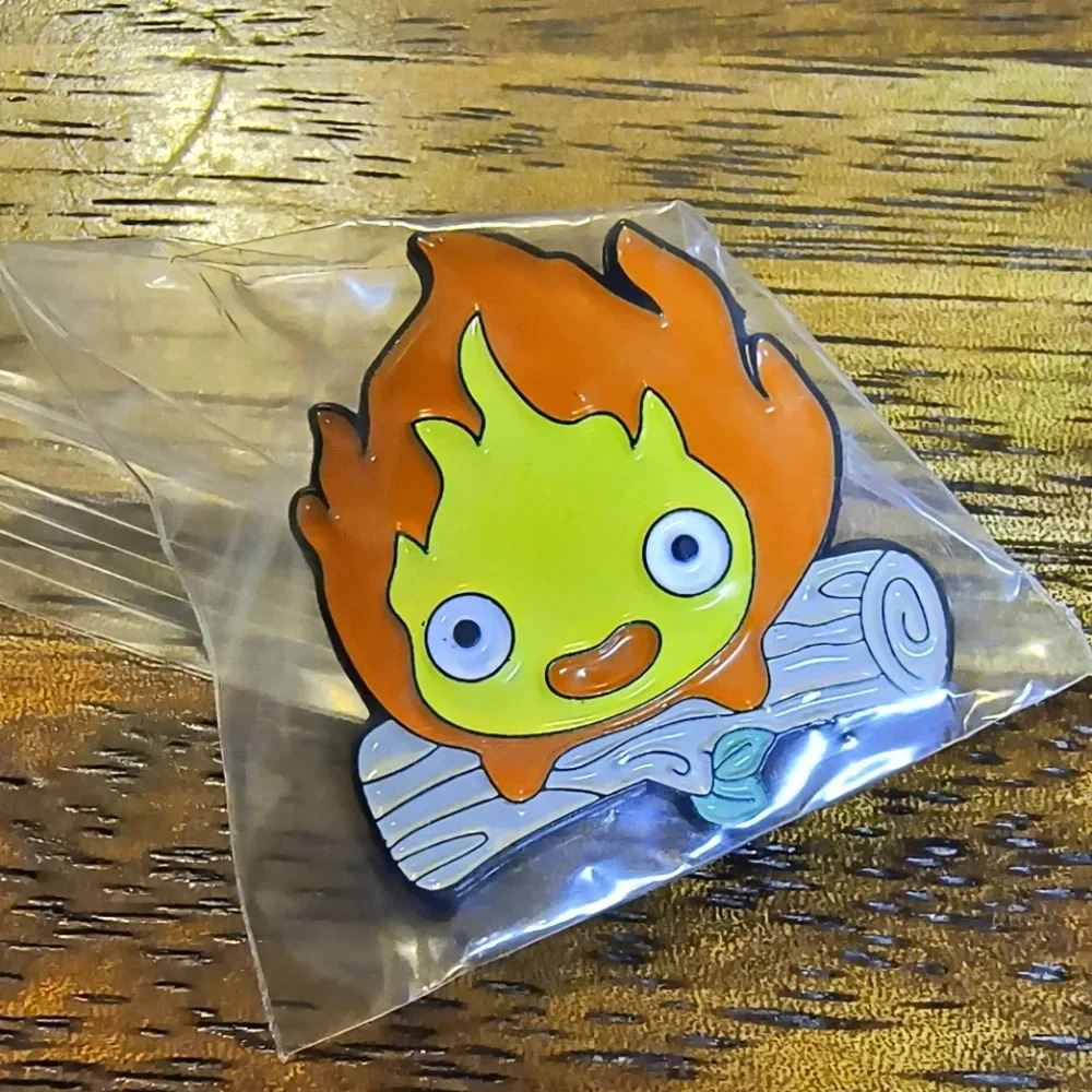 Calcifer howls moving castle anime studio Ghibli enamel pin backpack hat bag